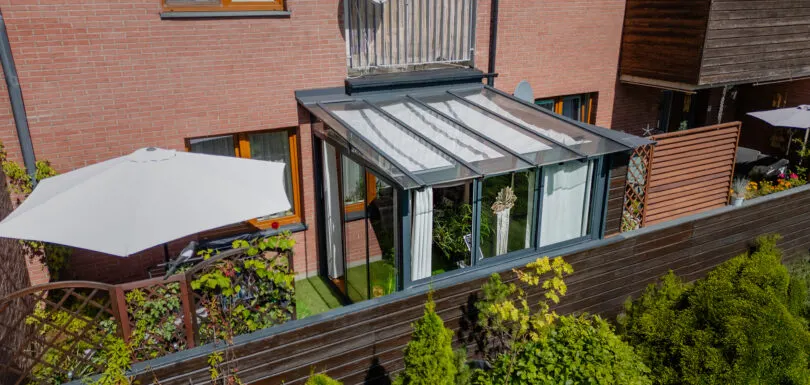 Balkonova, ogród zimowy z roletą w apartamentowcu, realizacja Tarasea